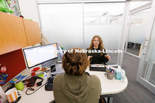 Laura Britten, Academic Navigator works with a student in the Explore Center. Explore Center photo s
