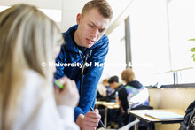 Jordan Brandt, senior in Spanish, student teaches at Lincoln Southeast High School. March 28, 2023. 