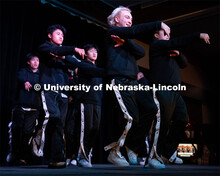 Members of Lambda Phi Epsilon perform during the OASIS and Fraternity and Sorority Life Stroll Off i