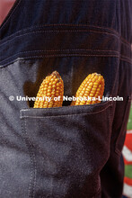 Ears of corn peak out of Herbie's back pocket. New Herbie photoshoot. April 7, 2023. 
