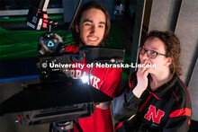 Sophomore emerging media arts majors Isaiah Griffith, left, and Marley Hewitt review footage on a ca