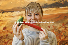 Emma Schlenker, a second-year law student, holds a gavel she carved from Eastern Cottonwood, the Neb