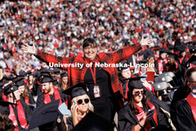 Annette Wetzel, Executive Director, Special Events and Protocol, smiles for a photo with her arms ou