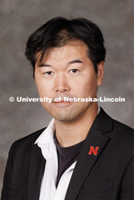 Studio portrait of Kazuo Yamazaki, Assistant Professor of Mathematics. 2023 New Faculty Orientation.
