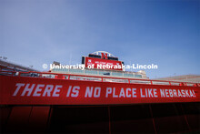 A sign in Memorial Stadium says "THERE IS NO PLACE LIKE NEBRASKA" at the Tunnel Walk in Memorial Sta