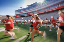 Students charge across the field at the Tunnel Walk. Tunnel Walk in Memorial Stadium. August 18, 202