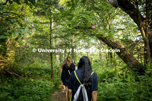 Avni Srivastav (front) and Caroline Gidlow take a nature walk at Prairie Pines. About Lincoln at Pra