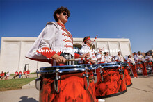 Battery percussion warm-up on Sheldon Museum of Art west steps. Northern Illinois football in Memori