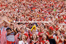 Fans throw the bones at the third down. Northern Illinois football in Memorial Stadium. September 16