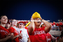 Dillon Parker, a freshman from California, cheers on the Huskers. Northern Illinois football in Memo