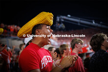Dillon Parker, a freshman from California, cheers on the Huskers. Northern Illinois football in Memo