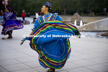 Dancers performing a traditional  dance. Fiesta on the green at the Nebraska Union Plaza. Fiesta on 