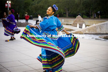 Dancers performing a traditional  dance. Fiesta on the green at the Nebraska Union Plaza. Fiesta on 