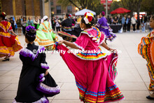 Dancers performing a traditional  dance. Fiesta on the green at the Nebraska Union Plaza. Fiesta on 