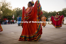 Dancers performing a traditional  dance. Fiesta on the green at the Nebraska Union Plaza. Fiesta on 