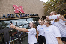 Team Chi Omega takes a selfie in front of the Nebraska East Union before beginning the race. Homecom