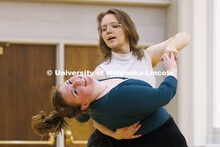 Sam Anthony Pharris dips Arielle Monson. Ballroom Dancing Club works through their final practice in