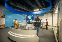 Museum guests look at the world globe exhibit. Morrill Hall and state museum for About Lincoln websi
