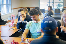 Yamen Seanwan (front) and Jay Mayberger laugh during their conversation at the Study Abroad Speed Da