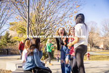 Group of friends sit and chat outside of the Union on City Campus. February 20, 2024. 
