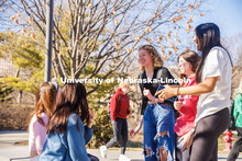 Group of friends sit and chat outside of the Union on City Campus. February 20, 2024. 