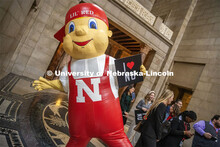 Lil Red poses for a picture in the Nebraska State Capitol Rotunda at I Love NU Day. March 6, 2024. 