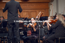 Andrea Alvarado, the Principal Viola for UNL's Symphony plays her viola at the UNL Symphony's Studen