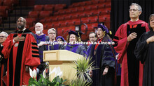 Professor Kristen Blankley performs the National Anthem. College of Law commencement in Devaney on t