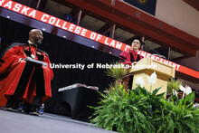 Dean Richard Moberly welcomes the crowd while Chancellor Rodney D. Bennett listens. College of Law c