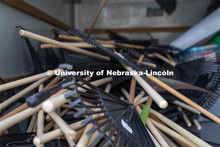 Stacks of garden rakes available for checkout for student volunteers for the Big Event. May 4, 2024.