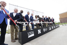 Dirt flies at the ceremonial groundbreaking following the program. The U.S. Department of Agricultur