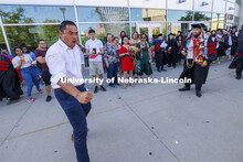 Sone Tuala performs a Haka, a south pacific chant, to honor his brother, Maika Malualeilagi Tuala (a