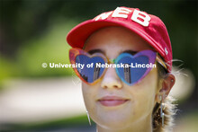 Mueller Tower is reflected in Saylor Newman’s sunglasses. Saylor is an incoming Fine and Performin