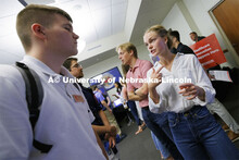 Raikes Design Studio held a job fair in the Gaughan Center where students meet the clients in a job 