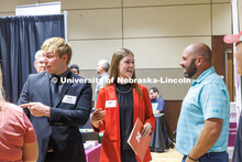 Jaylea Pope, a Junior Ag Leadership, Education and Communication student talks to a recruiter at the