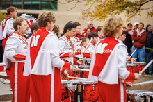 The Husker marching band drummers practice in front of the Sheldon Museum for the Nebraska vs UCLA f