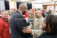 Chancellor Rodney Bennett, left, shakes hands with General Anthony J. Cotton during the Huddle Up Pr