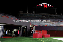 NROTC Staff Sergeant Dylon Taylor walks into Memorial Stadium. Navy and Marine Corps 249th birthday 