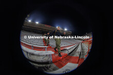 NROTC midshipmen climb flights of east stadium stairs. Navy and Marine Corps 249th birthday celebrat