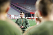 NROTC Staff Sergeant Dylon Taylor gives workout instructions to midshipmen. Navy and Marine Corps 24