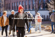 A student walks to his next class in the frigid temperatures of January. First day of spring semeste