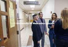 Assistant Professor Jessica Murphy (right) talks with law students in the Criminal Clinic. College o