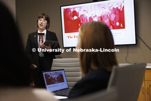 Lecturer Rachel Tomlinson Dick (center) talks with students in the Housing Justice Clinic. College o
