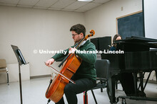 Connor Peterson, a senior music major, performs on the Cello for the viola master class in the Westb