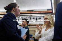 Stacy Dabrowski, a sophomore Actuarial Science major, speaks with a representative from Northwestern