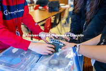 The Lincoln High School students participate in the Vex Robotics class after school by taking apart 