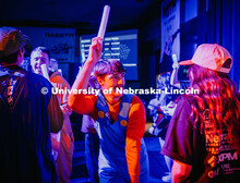 Eli Hiser, the Director of Recruitment and a junior biological sciences major, dances with glow stic