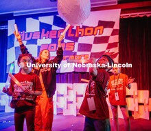 A child from Alex’s “pit crew” hits the blow-up ball during the Huskerthon rave party. Huskert