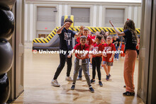 Alex, a Miracle Child, dances in the front of the line as they wait for the introduction of the 2025