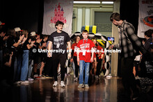 Alex, a Miracle Child, walks through the crowd as they do the introduction of the 2025 families. Hus